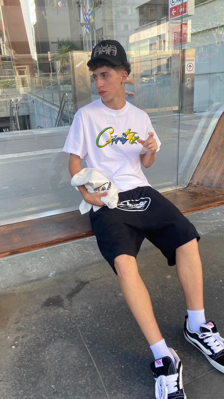 Graffiti graphic tee with black shorts skate style